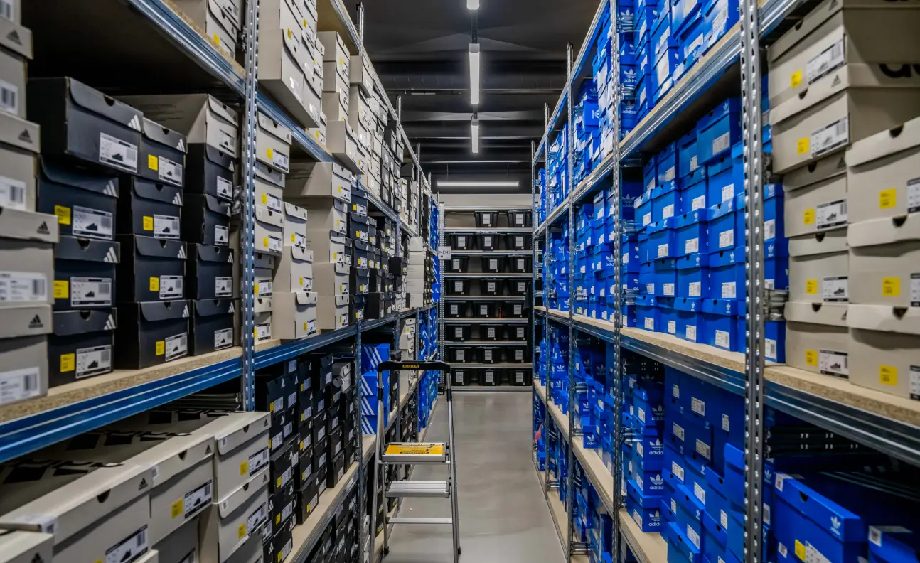 High-density compactus shelving system for efficient retail stockroom storage and space optimisation
